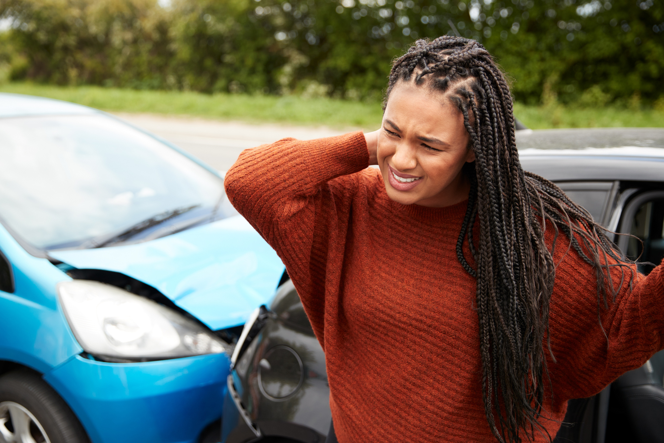 Female Motorist with Whiplash Injury in Car Crash 